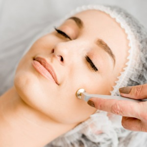 woman during the facial treatment procedure picture id916799706 2