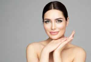 Beautiful woman with cosmetic facial treatments like dermal filler or facial implants