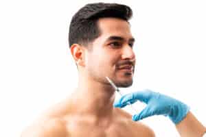 Person getting dermal fillers for gender affirming in Denver, CO