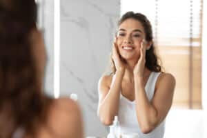 Woman smiling looking young and fresh from endoscopic mid-facelift in Denver